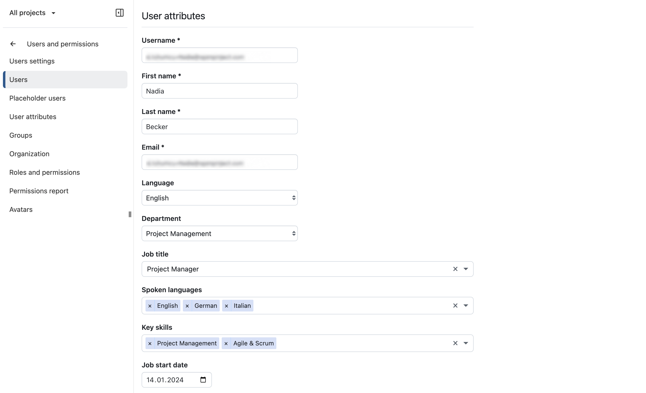 OpenProject’s user profile shows user attributes such as department, job title, spoken languages, and key skills.