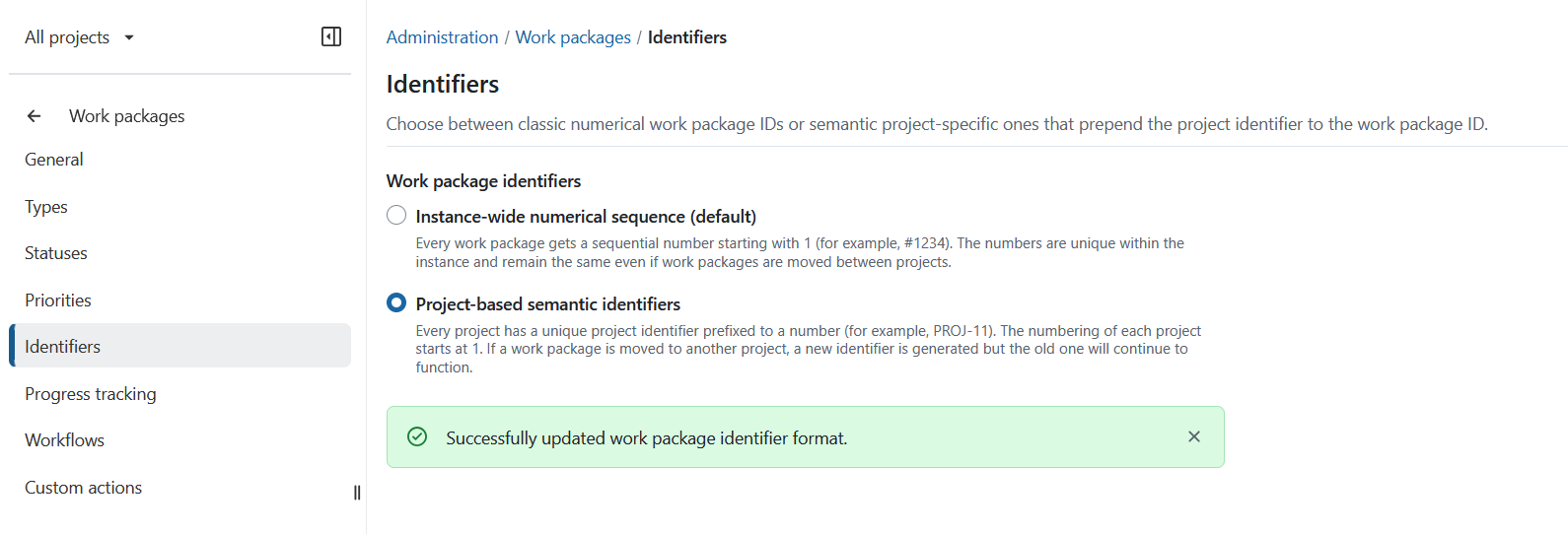 Successful confirmation message after the conversion process when switching from numeric to project-based work package identifiers in OpenProject
